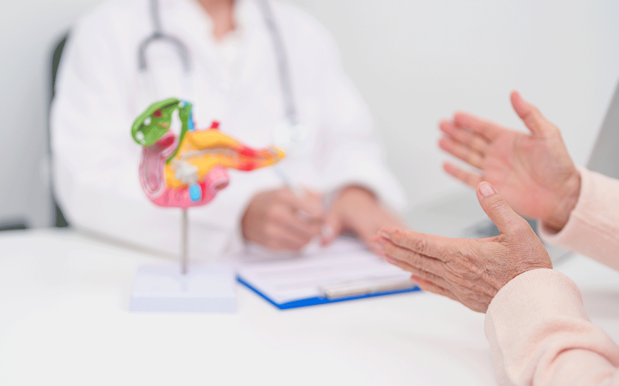 A doctor providing a specialist consultation regarding pancreatic cancer